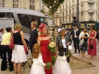 Arrival of the bus with bride and guests at the mayor&#39;s office 